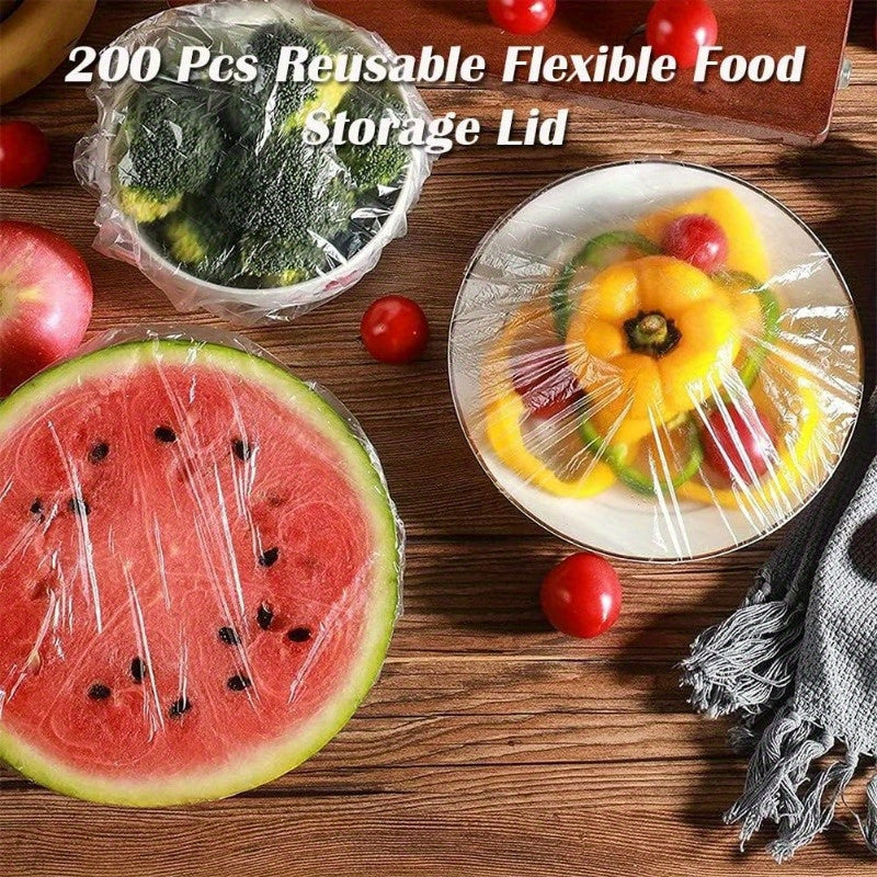 Collection of 100 durable cling bags for storing food, sealing bowls, and wrapping fruit. Ideal for picnics, hotels, leftovers, and outdoor use. Can also double as a see-through shower cap for hair salons and restaurants.