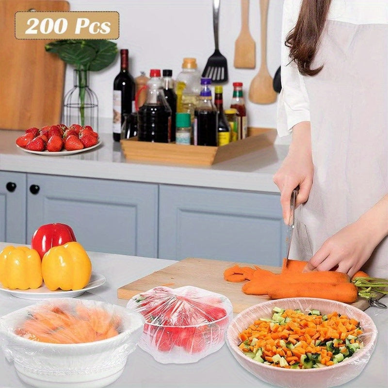 Collection of 100 durable cling bags for storing food, sealing bowls, and wrapping fruit. Ideal for picnics, hotels, leftovers, and outdoor use. Can also double as a see-through shower cap for hair salons and restaurants.