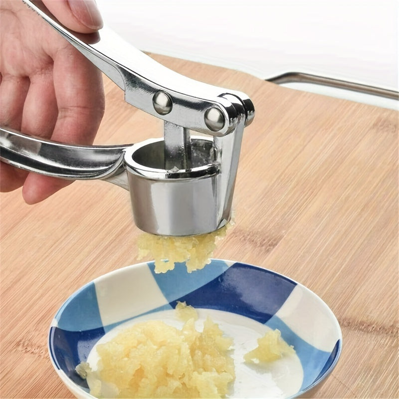 Premium stainless steel garlic press for easy crushing without electricity.