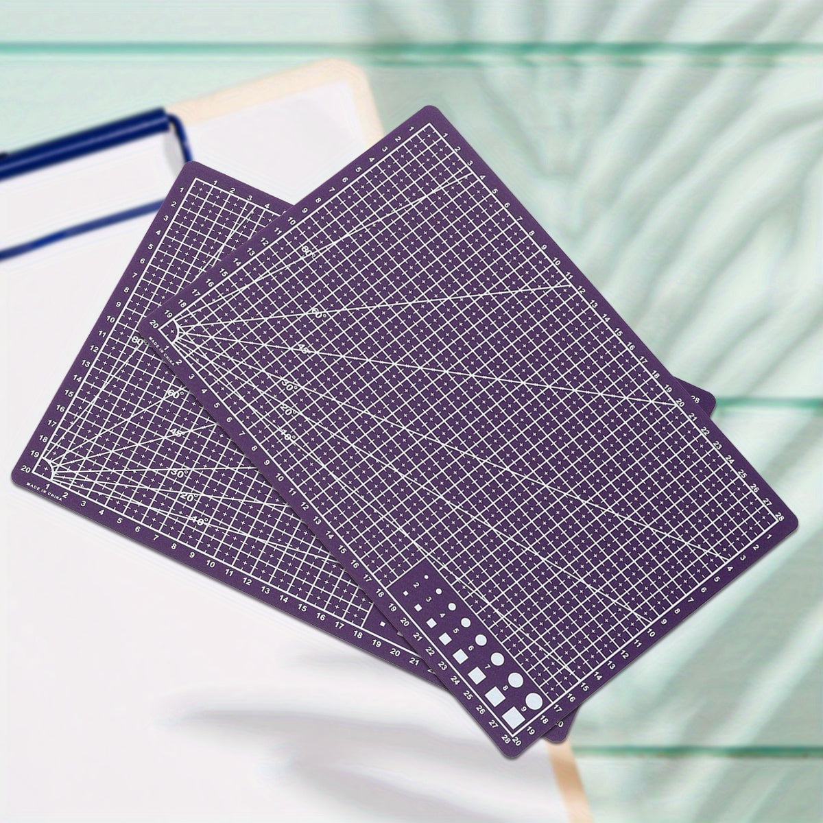 Durable PP material rotary cutting mat for precision sewing and scrapbooking, ideal for crafters and DIY enthusiasts, protects surfaces and ensures precise cuts.