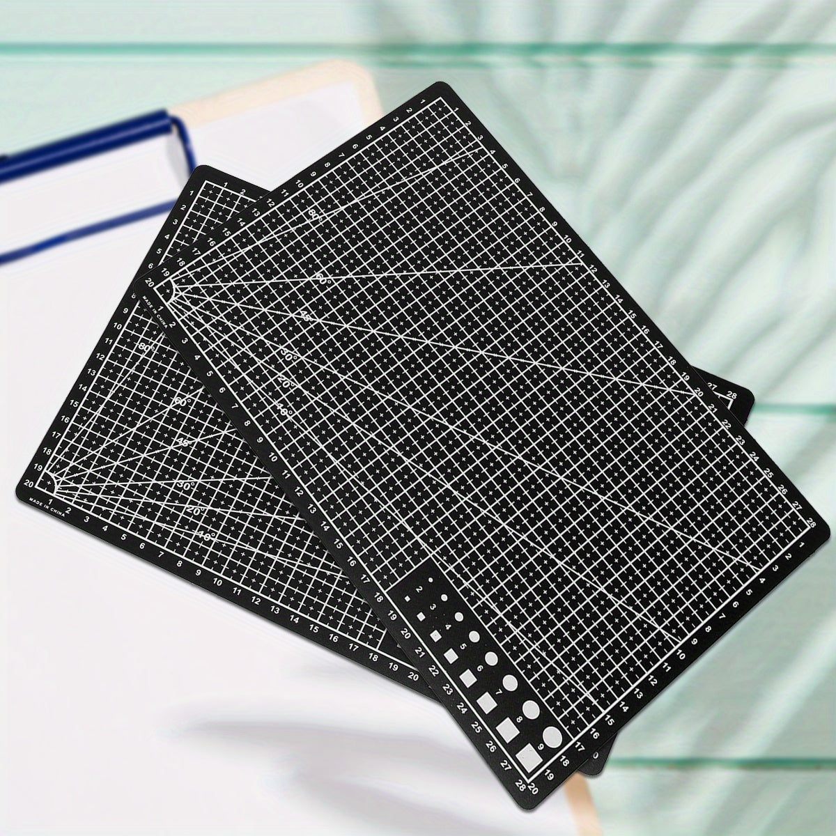 Durable PP material rotary cutting mat for precision sewing and scrapbooking, ideal for crafters and DIY enthusiasts, protects surfaces and ensures precise cuts.