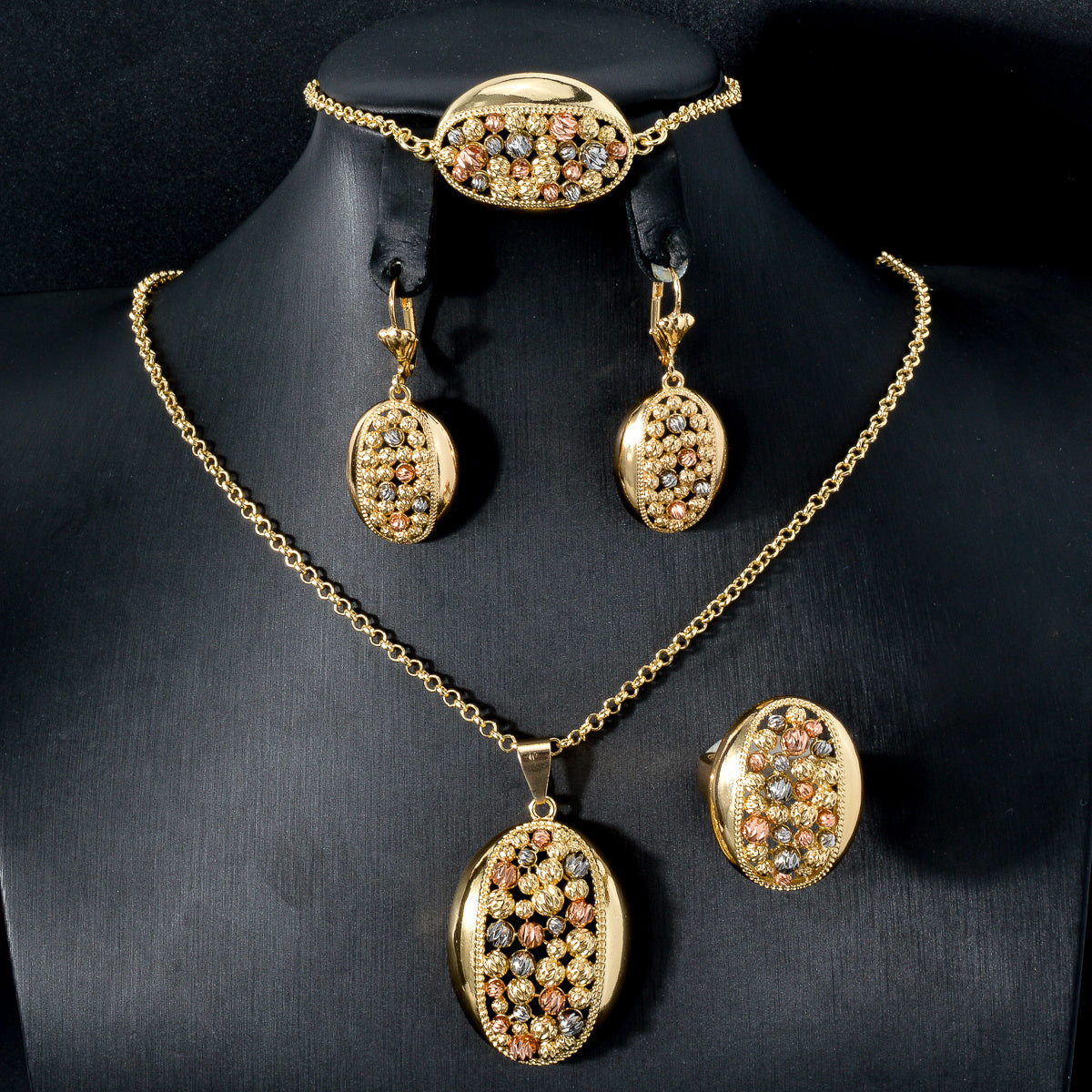 A stunning Indian-style jewelry set consisting of a necklace pendant, bracelet, ring, and earrings. This colorful and elegant four-piece set is the perfect gift for weddings, parties, and birthdays. Get your hands on this hot-selling fashion jewelry set