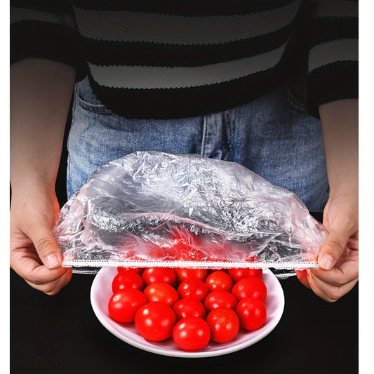 One hundred disposable plastic food storage covers with elastic ties. These reusable sealable cling film lids are suitable for bowls, plates, pots, boxes, and trays. Keep your food dustproof, insect-proof, and safe with these kitchen storage caps.