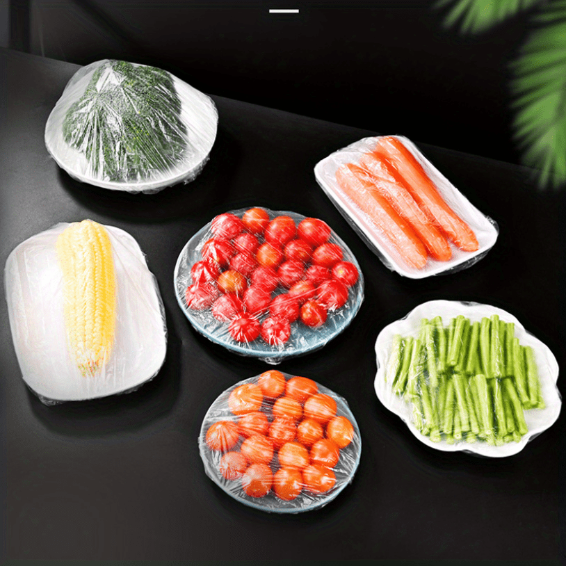 One hundred disposable plastic food storage covers with elastic ties. These reusable sealable cling film lids are suitable for bowls, plates, pots, boxes, and trays. Keep your food dustproof, insect-proof, and safe with these kitchen storage caps.