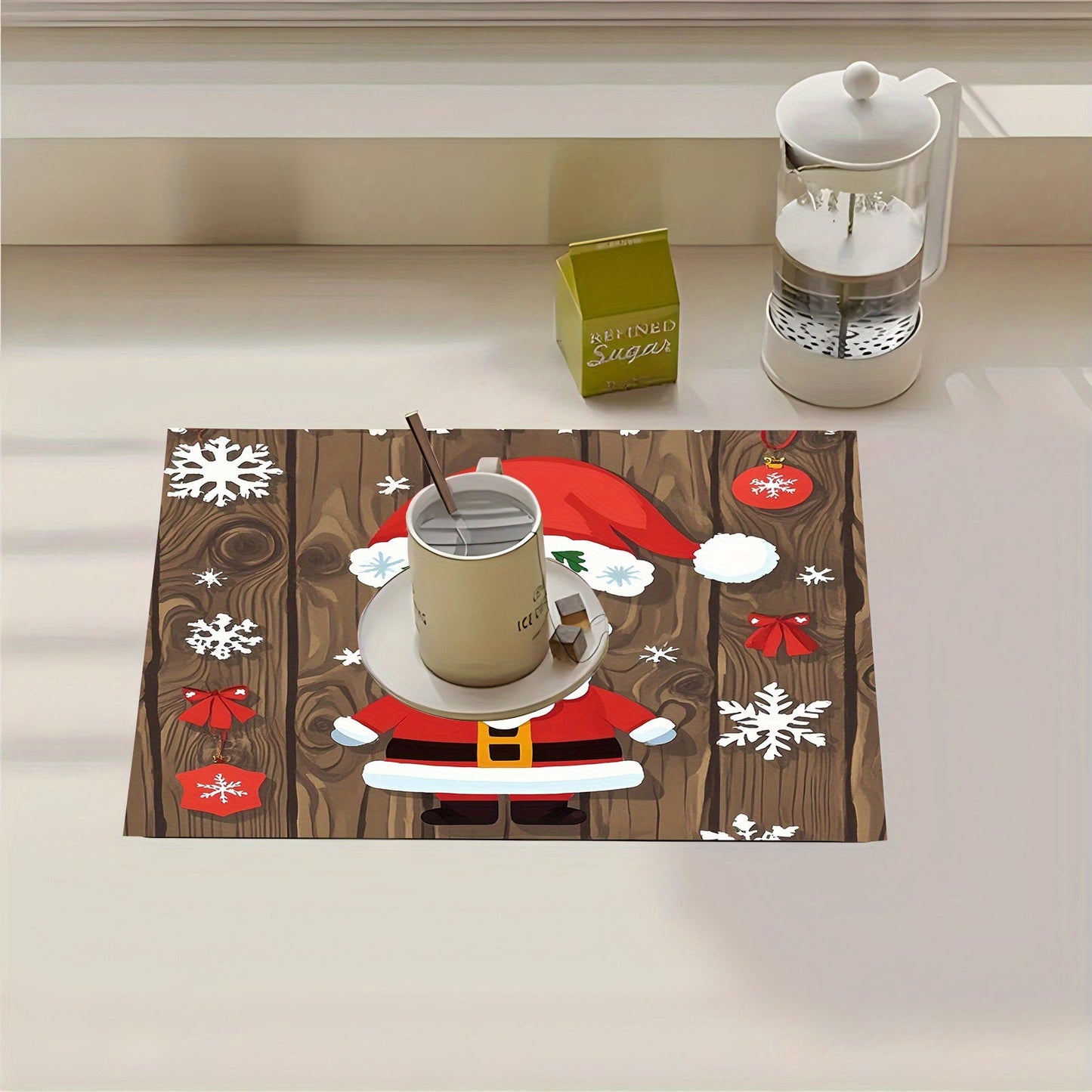 This festive rubber dish drying mat showcases Christmas decorations, holiday party elements, gifts, trees, Santa Claus, bells, and more. It is a versatile kitchen accessory that can be used for drying dishes, protecting countertops, as absorbent