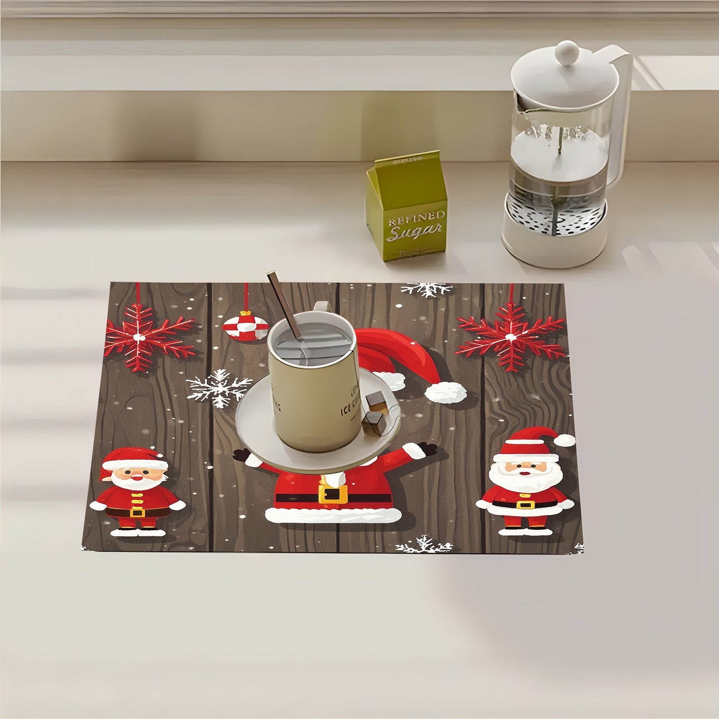 This rubber dish drying mat is adorned with festive Christmas decorations, creating a holiday party atmosphere with elements such as Christmas gifts, trees, Santa Claus, bells, and more. It is a versatile kitchen accessory that can be used for drying