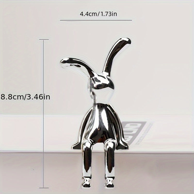 Golden and silver sitting rabbit figurines - Elegant bunny statues for home, office, and cafe decor.