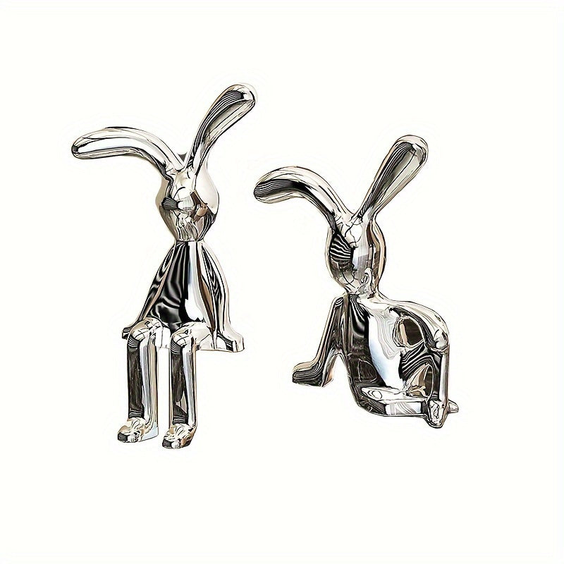 Golden and silver sitting rabbit figurines - Elegant bunny statues for home, office, and cafe decor.