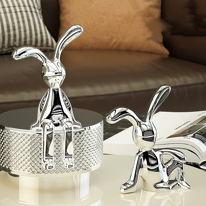 Golden and silver sitting rabbit figurines - Elegant bunny statues for home, office, and cafe decor.