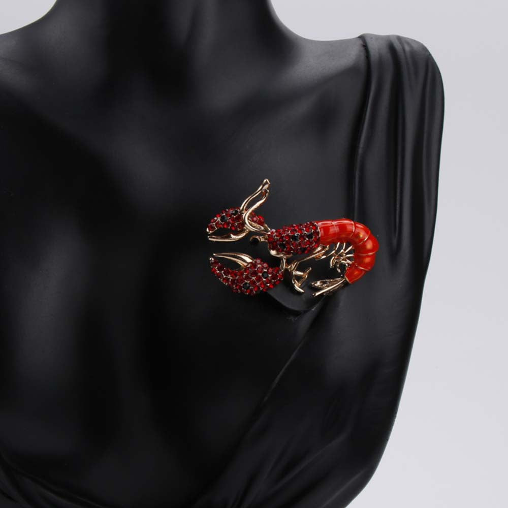 Elegant antique lobster brooch adorned with shimmering rhinestones and finished with enamel - Ideal for adding a touch of luxury to men's suits and accessories.