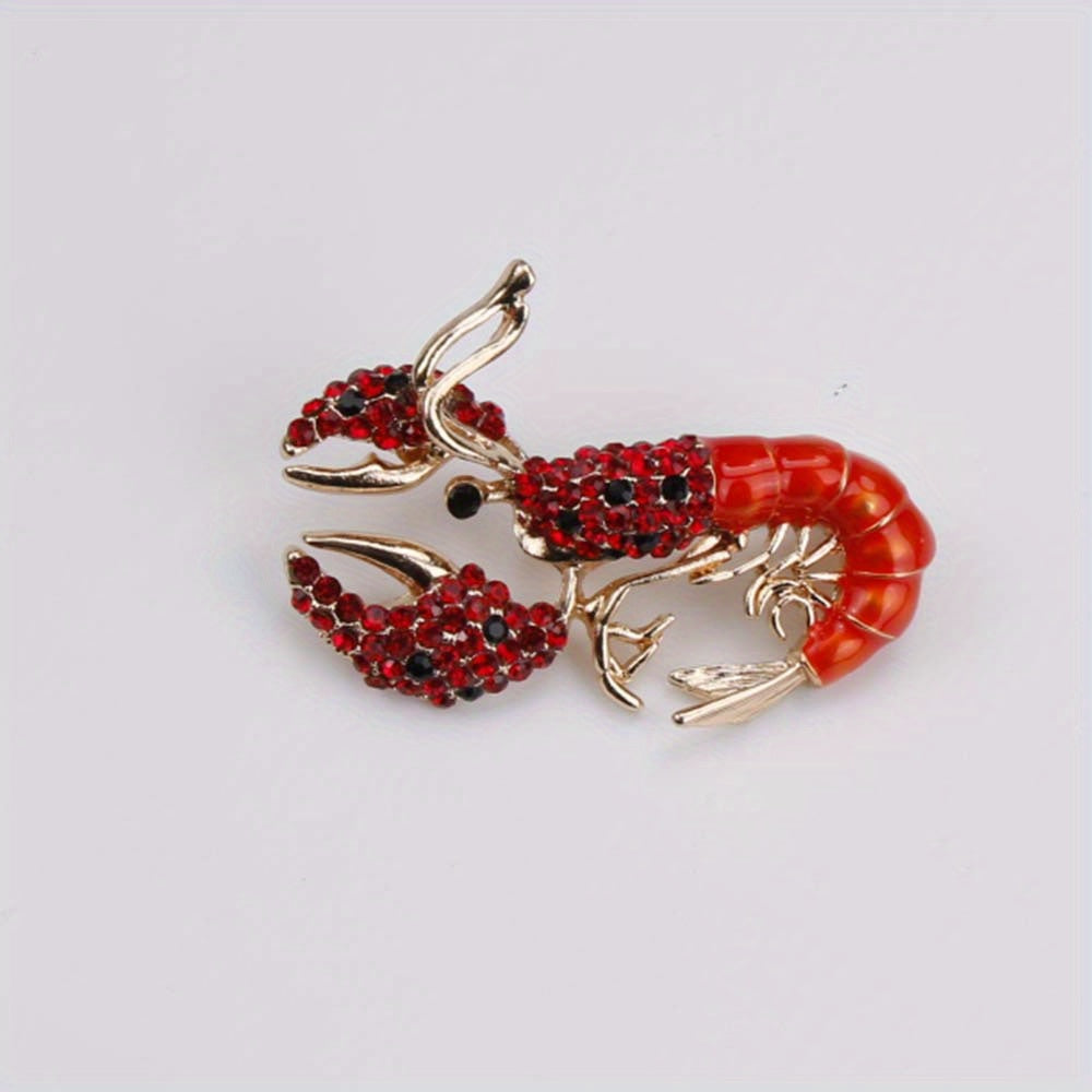 Elegant antique lobster brooch adorned with shimmering rhinestones and finished with enamel - Ideal for adding a touch of luxury to men's suits and accessories.