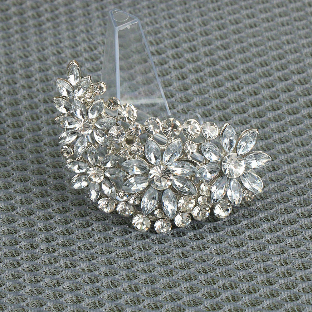 Luxurious enamel water crystal brooch inspired by vintage designs, featuring an irregular shiny pattern. This women's fashion accessory is perfect for adding a touch of elegance to banquet dresses, novelty clothing, and jewelry collections. Stand out