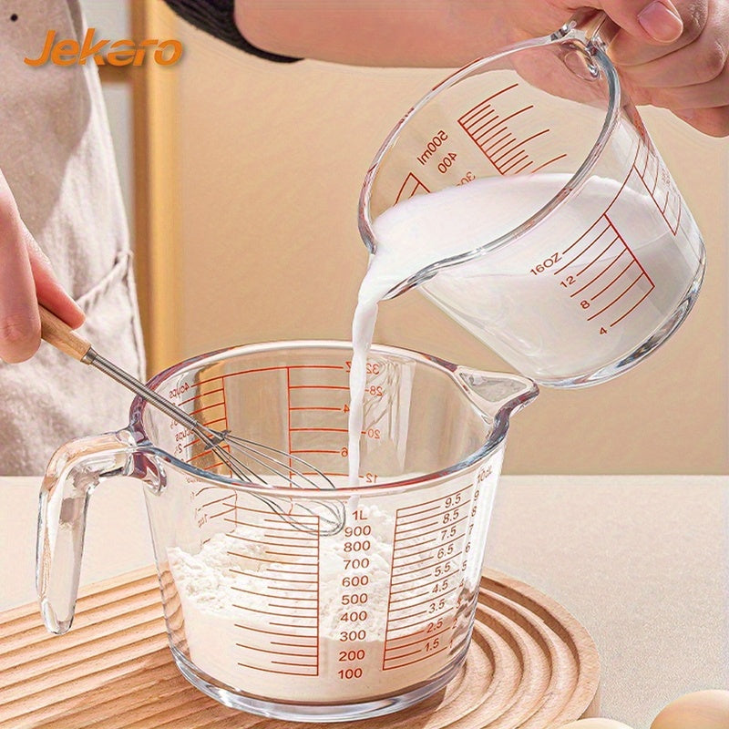 500ml heat-resistant glass measuring cup: precise scale, ergonomic handle, microwave/oven safe for baking/cooking.