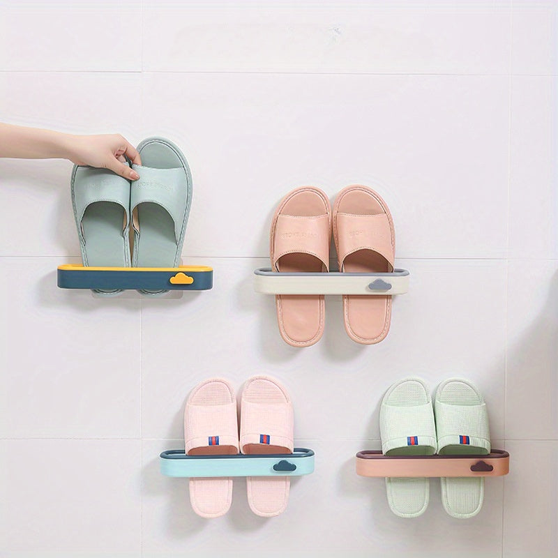 Wall-mounted shoe rack inspired by clouds, no drilling needed. Made of space-saving plastic for storing slippers in the bathroom.