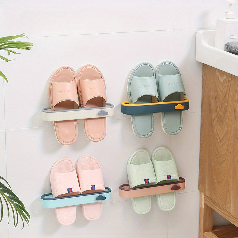 Wall-mounted shoe rack inspired by clouds, no drilling needed. Made of space-saving plastic for storing slippers in the bathroom.