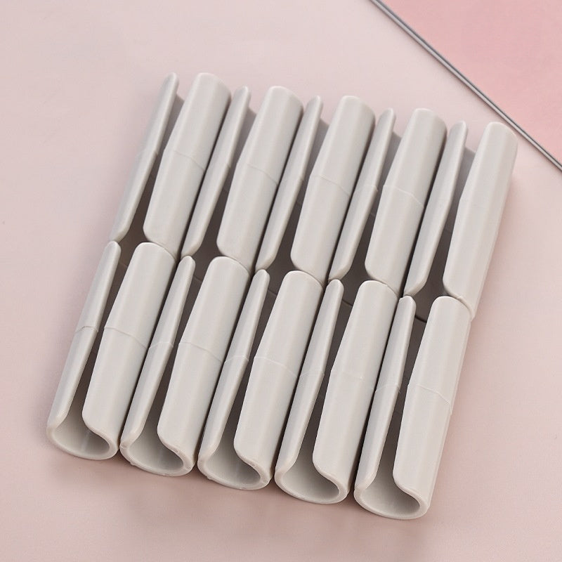 15 pieces of mixed color sheet clips that are non-slip, invisible, traceless, and anti-running bed mattress buckles. These clips are a no-needle artifact needle and can be used as household kitchen bedding accessories for partial cleaning care.