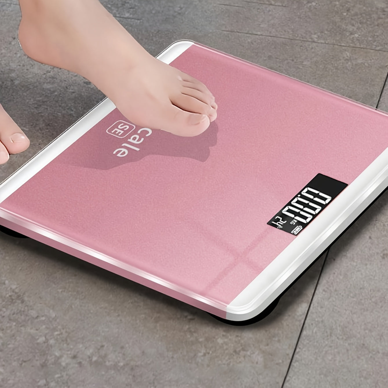 Pink and black digital scale for accurate weight monitoring. Battery-free operation, durable design. Perfect holiday gift for adults.