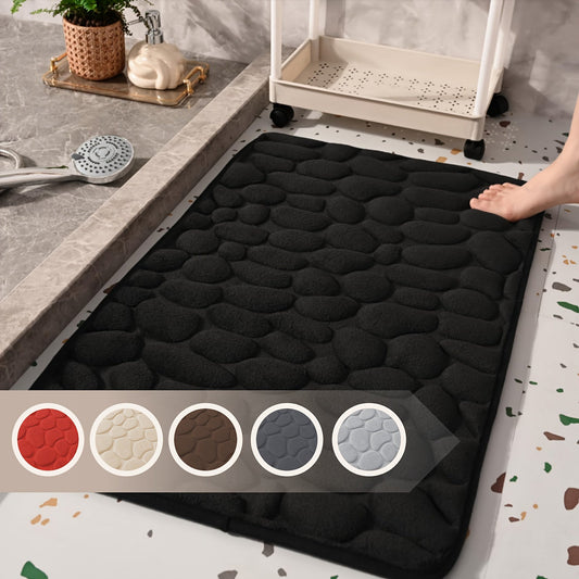 Soft and luxurious memory foam bath mat featuring a stylish geometric design. This non-slip, machine washable coral fleece rug is perfect for adding comfort and decoration to your bathroom or outdoor space.