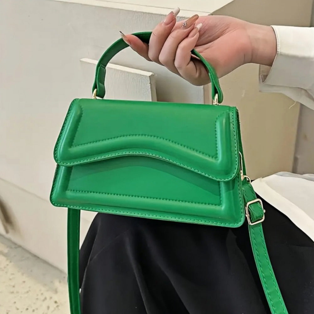 Women's Fashion Crossbody Shoulder Bag in solid color faux leather with adjustable strap, buckle closure, painted edges, perfect for casual or elegant occasions in Guangzhou.