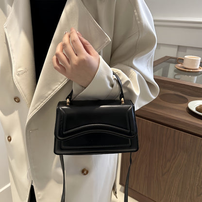 Women's Fashion Crossbody Shoulder Bag in solid color faux leather with adjustable strap, buckle closure, painted edges, perfect for casual or elegant occasions in Guangzhou.