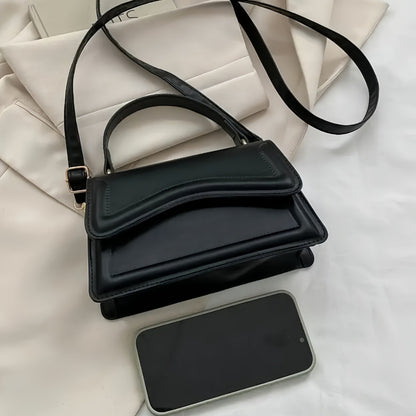 Women's Fashion Crossbody Shoulder Bag in solid color faux leather with adjustable strap, buckle closure, painted edges, perfect for casual or elegant occasions in Guangzhou.