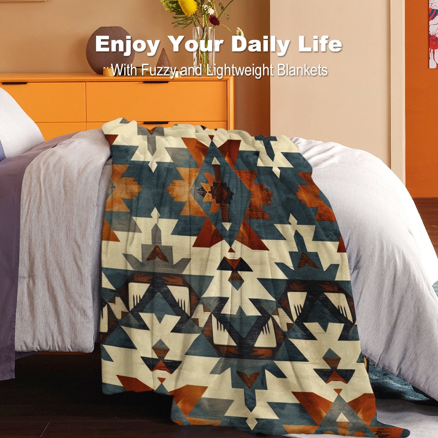 Soft and cozy Aztec-inspired digital print flannel blanket for bed, sofa, and travel. This lightweight, all-season blanket offers warmth, is machine washable, and made of 100% polyester with a contemporary style and no embellishment.