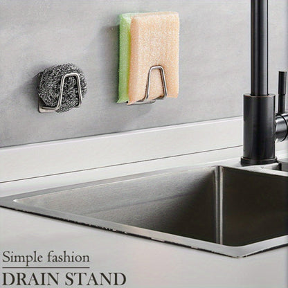 The Stainless Steel Kitchen Sink Storage Rack is a self-adhesive, wall-mounted organizer for sponges and cloths. It is available in sets of 1, 3, or 5 pieces.