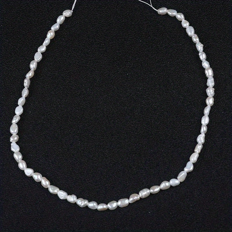 Natural freshwater pearl beads, double-sided 4-5mm, drilled for DIY jewelry, 20cm strand with luster.