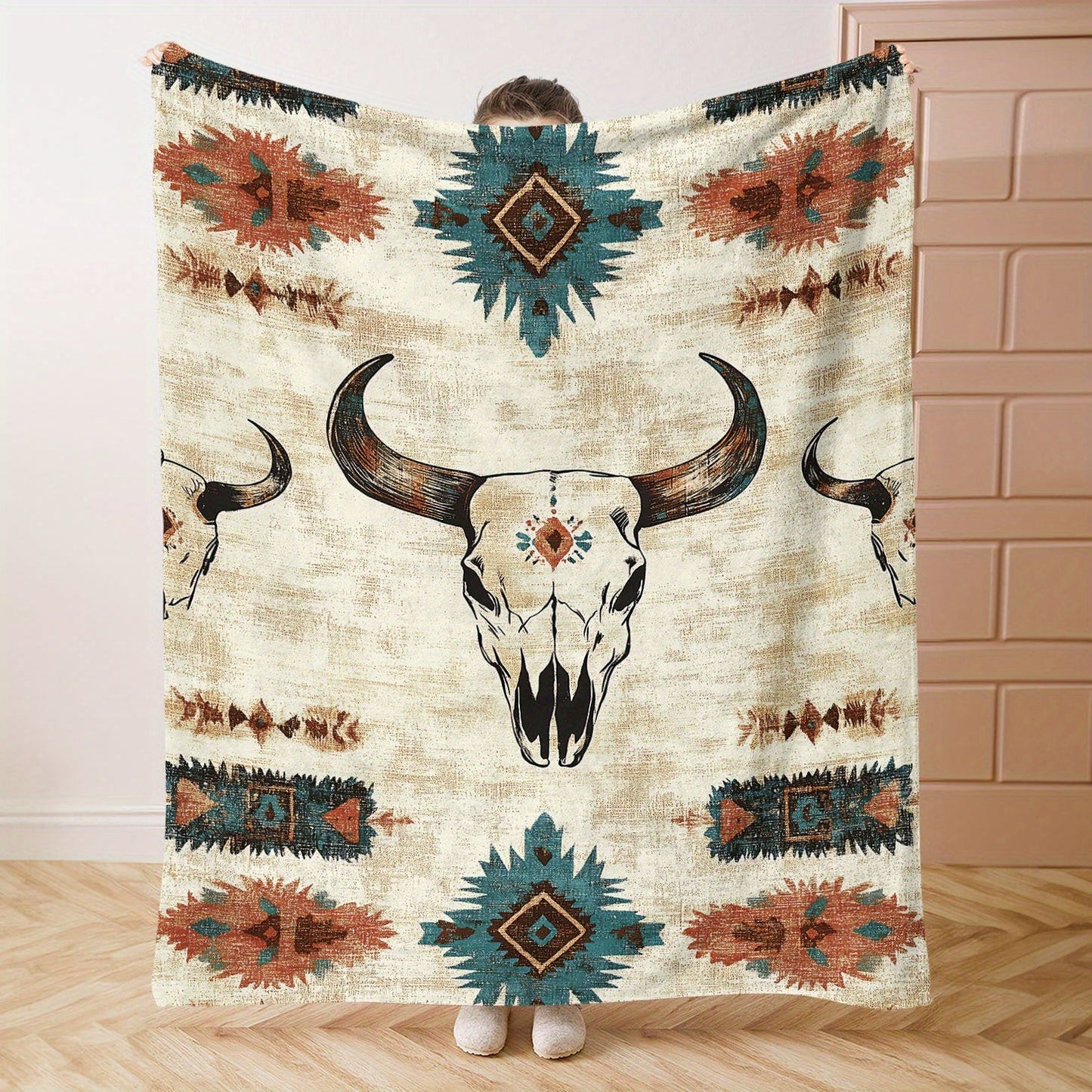 Soft knitted polyester throw blanket with a Western cow skull print. Perfect for bed, sofa, office, or camping. Suitable for all seasons with a mid-century style. Lightweight fabric weighing 200-250g. Features a digital print with no embellishments.