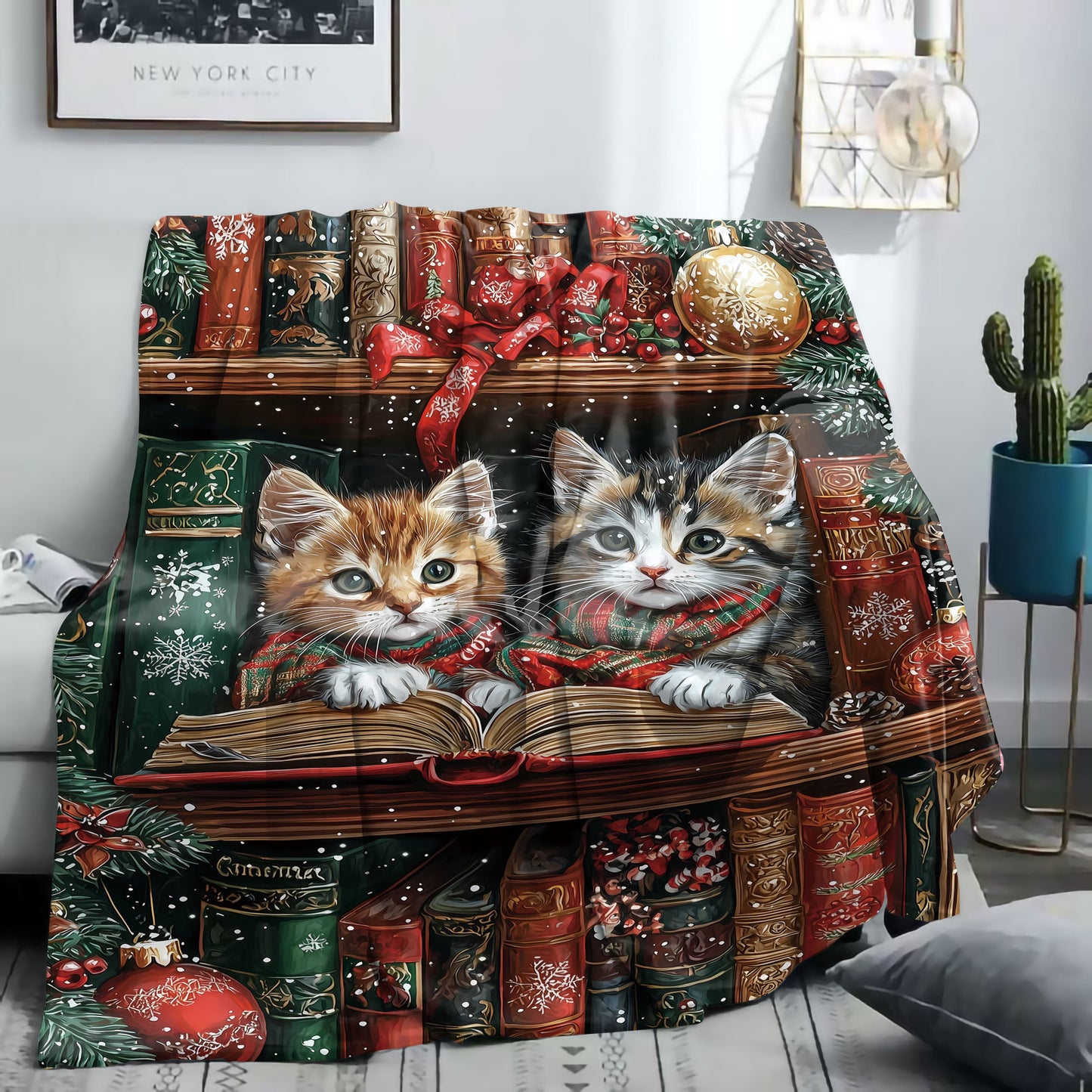 One piece of a mid-century style flannel blanket featuring Christmas kittens reading on a shelf. This soft knit throw weighs 200-250g and is digitally printed. Perfect for use on a bed, sofa, office, or while camping, this all-season blanket has a