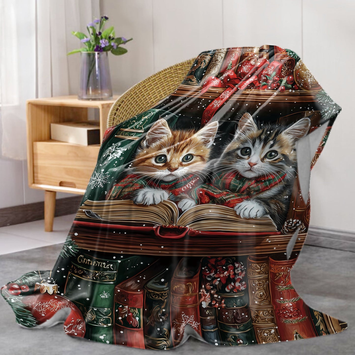 One piece of a mid-century style flannel blanket featuring Christmas kittens reading on a shelf. This soft knit throw weighs 200-250g and is digitally printed. Perfect for use on a bed, sofa, office, or while camping, this all-season blanket has a