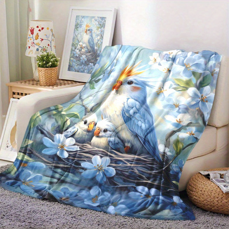 One piece of Fashion Parrot and Baby Print Knitted Polyester Fleece Blanket, designed for softness and warmth. Features a digital print, envelope stitch, and weighs 200-250g. Perfect for all seasons and various uses such as naps, camping, travel, car