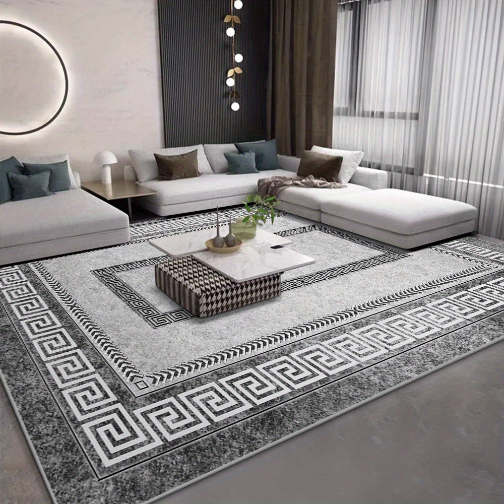 Upgrade your living room with our luxurious Velvet Rug, featuring a modern grey rectangle design with a Chinese texture border. Made from soft and non-slip machine washable polyester, this lightweight rug is fade resistant and perfect for any indoor