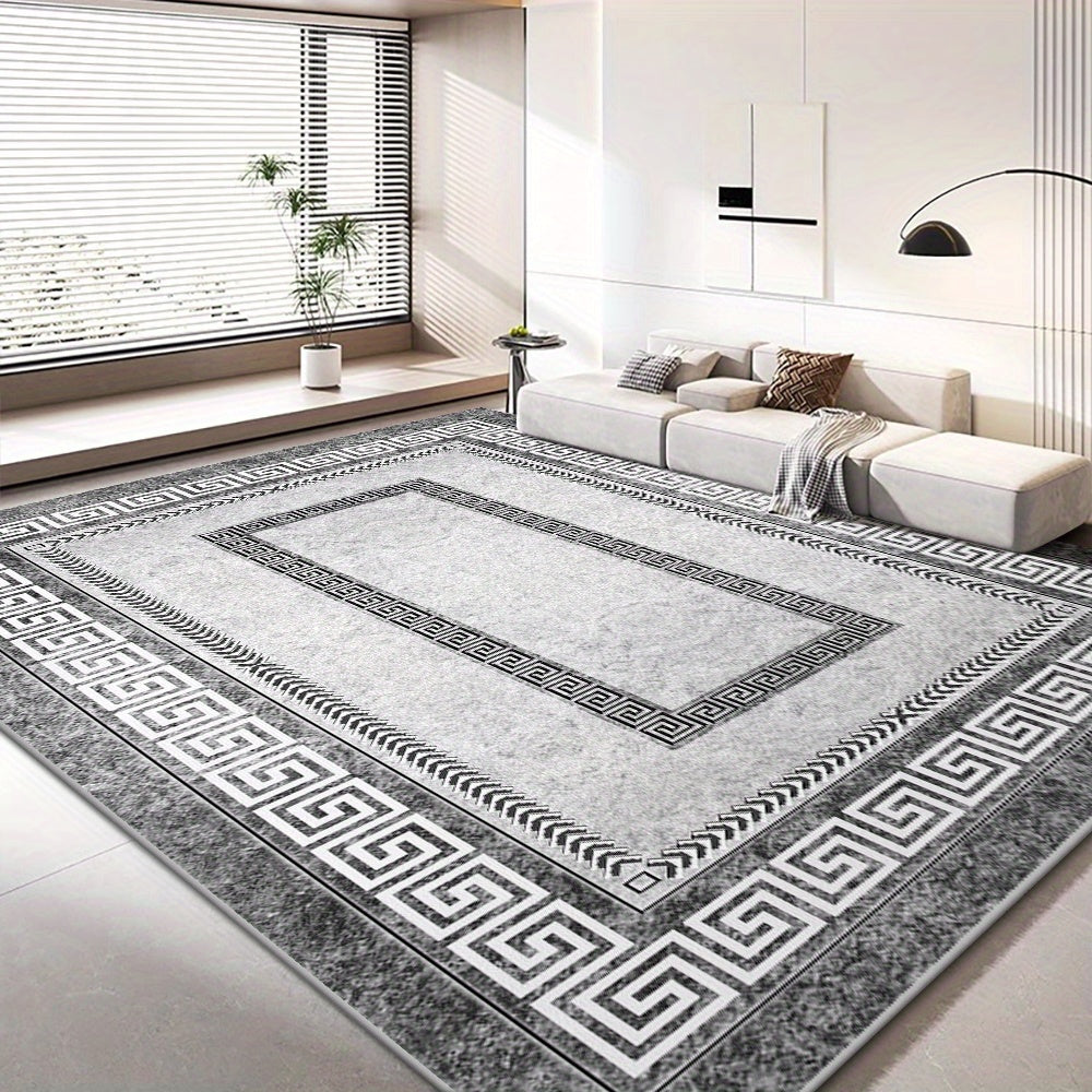 Upgrade your living room with our luxurious Velvet Rug, featuring a modern grey rectangle design with a Chinese texture border. Made from soft and non-slip machine washable polyester, this lightweight rug is fade resistant and perfect for any indoor