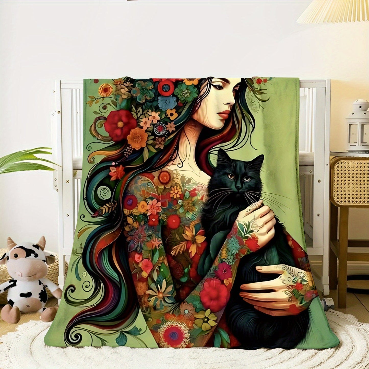 Soft knitted polyester flannel throw blanket featuring a floral girl with black cat print design, measuring 70x100cm. This contemporary style blanket is perfect for all seasons and makes a versatile home decor gift for the living room, nap time, sofa, or