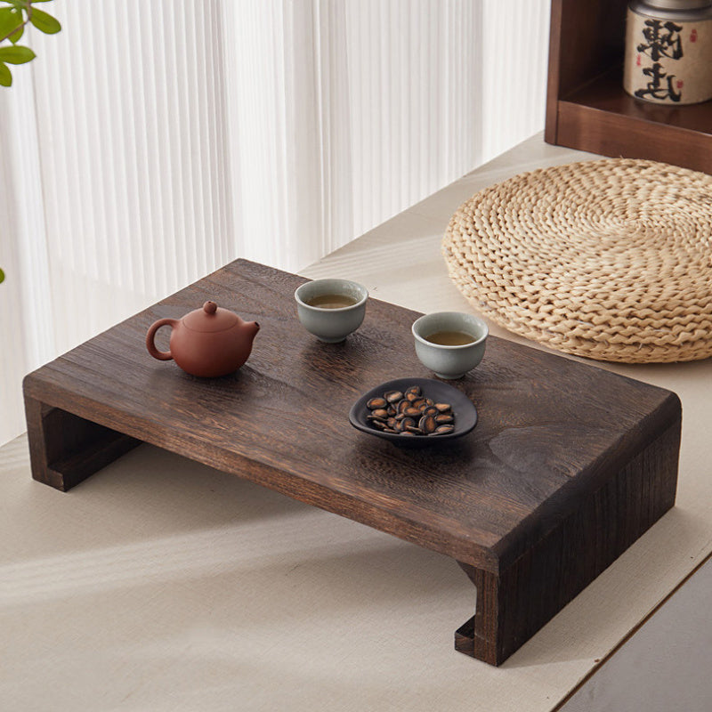 Versatile low wooden tea table with Japanese inspiration for multiple spaces in your home or office.