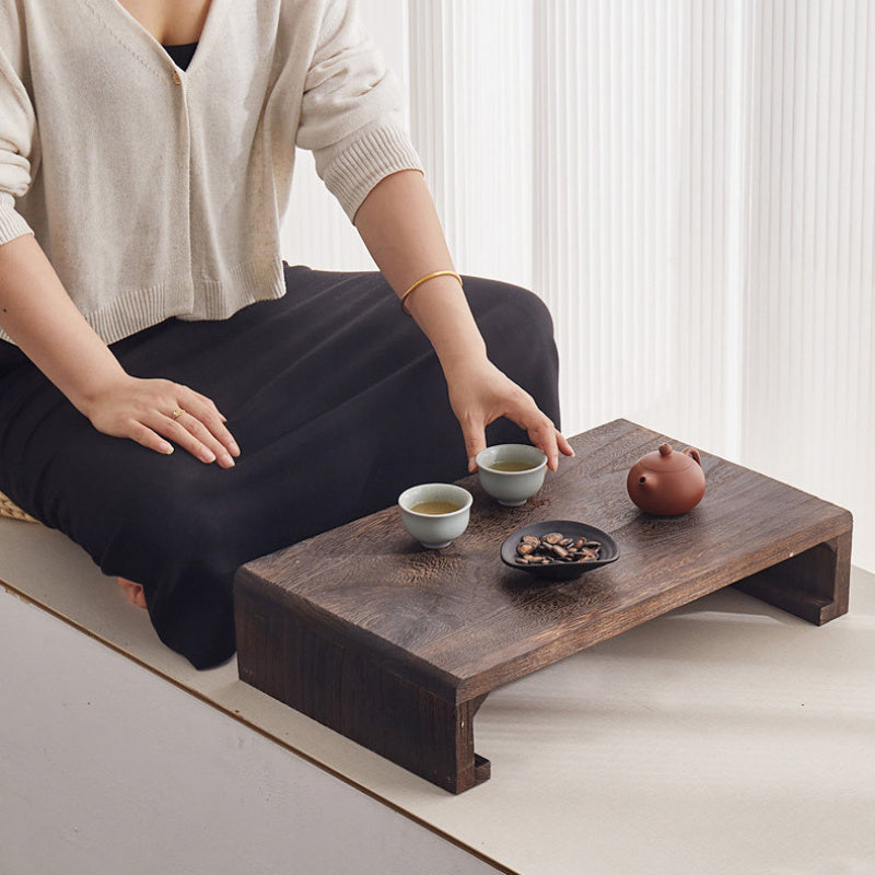 Versatile low wooden tea table with Japanese inspiration for multiple spaces in your home or office.