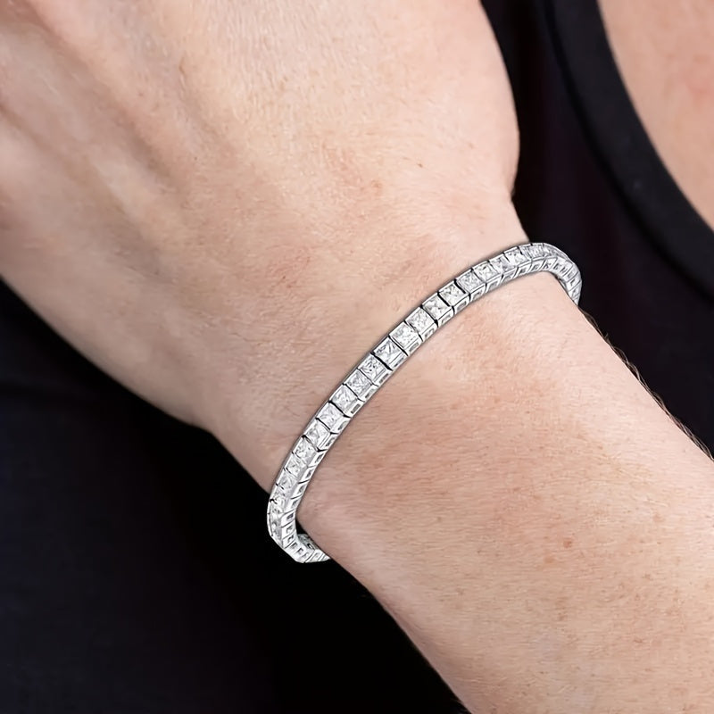 Elegant and simple, this 925 sterling silver Moissanite square tennis bracelet is perfect for everyday wear or as a thoughtful gift. Ideal for Valentine's Day or any season, this accessory adds a touch of sophistication to any outfit.