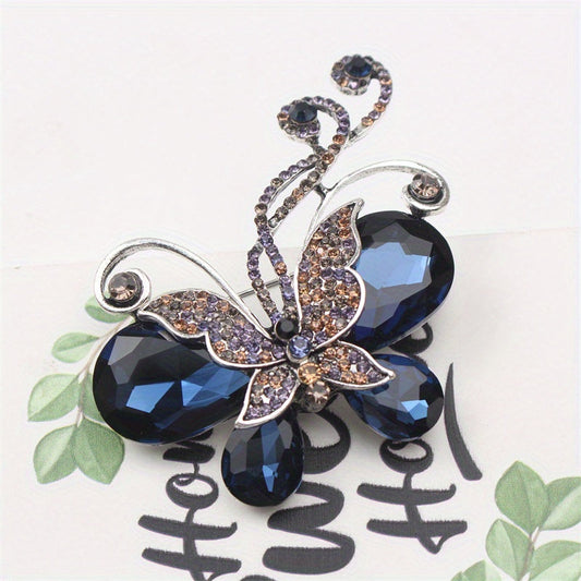 A stylish Vintage Crystal Butterfly Brooch adorned with Rhinestones, perfect for any woman. This Elegant Faux Crystal Butterfly Brooch is ideal for embellishing coats, dresses, bags, or corsages.