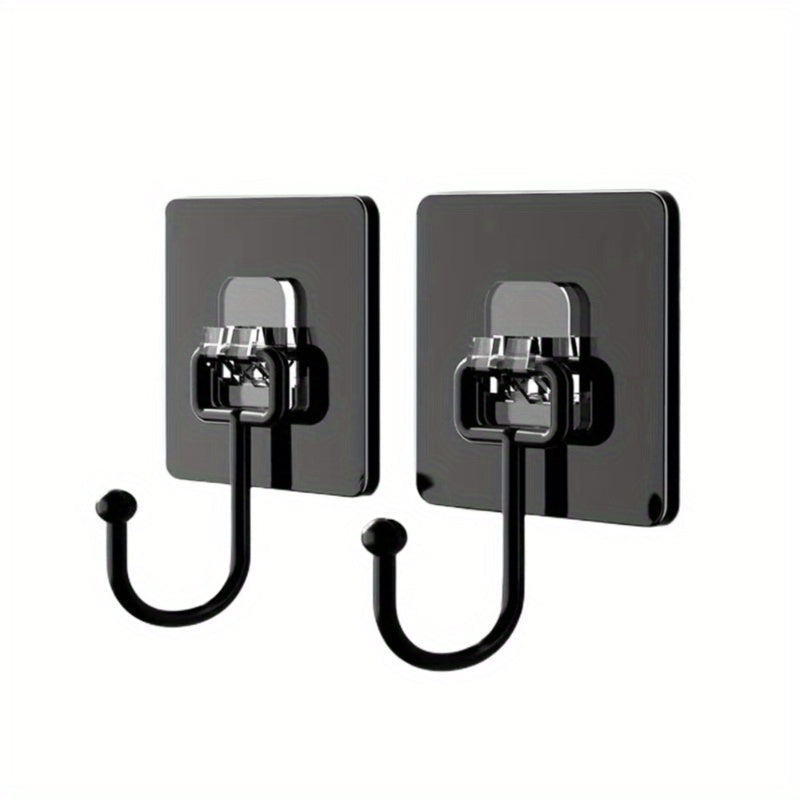 Two contemporary plastic wall hooks to easily install with self-adhesive backing. These heavy-duty, waterproof hangers are perfect for coats, towels, keys, and sundries. Versatile for use in bathrooms, toilets, kitchens, and more.