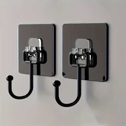 Two contemporary plastic wall hooks to easily install with self-adhesive backing. These heavy-duty, waterproof hangers are perfect for coats, towels, keys, and sundries. Versatile for use in bathrooms, toilets, kitchens, and more.