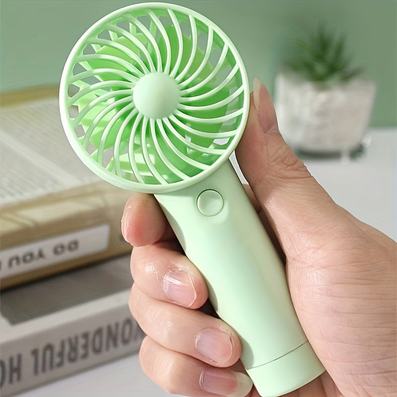 Ideal for both indoor and outdoor use, this portable handheld fan features a 3-speed setting and a 400mAh USB rechargeable battery. With a wearable electric design and button control, this mini fan is made of durable plastic material. It makes the