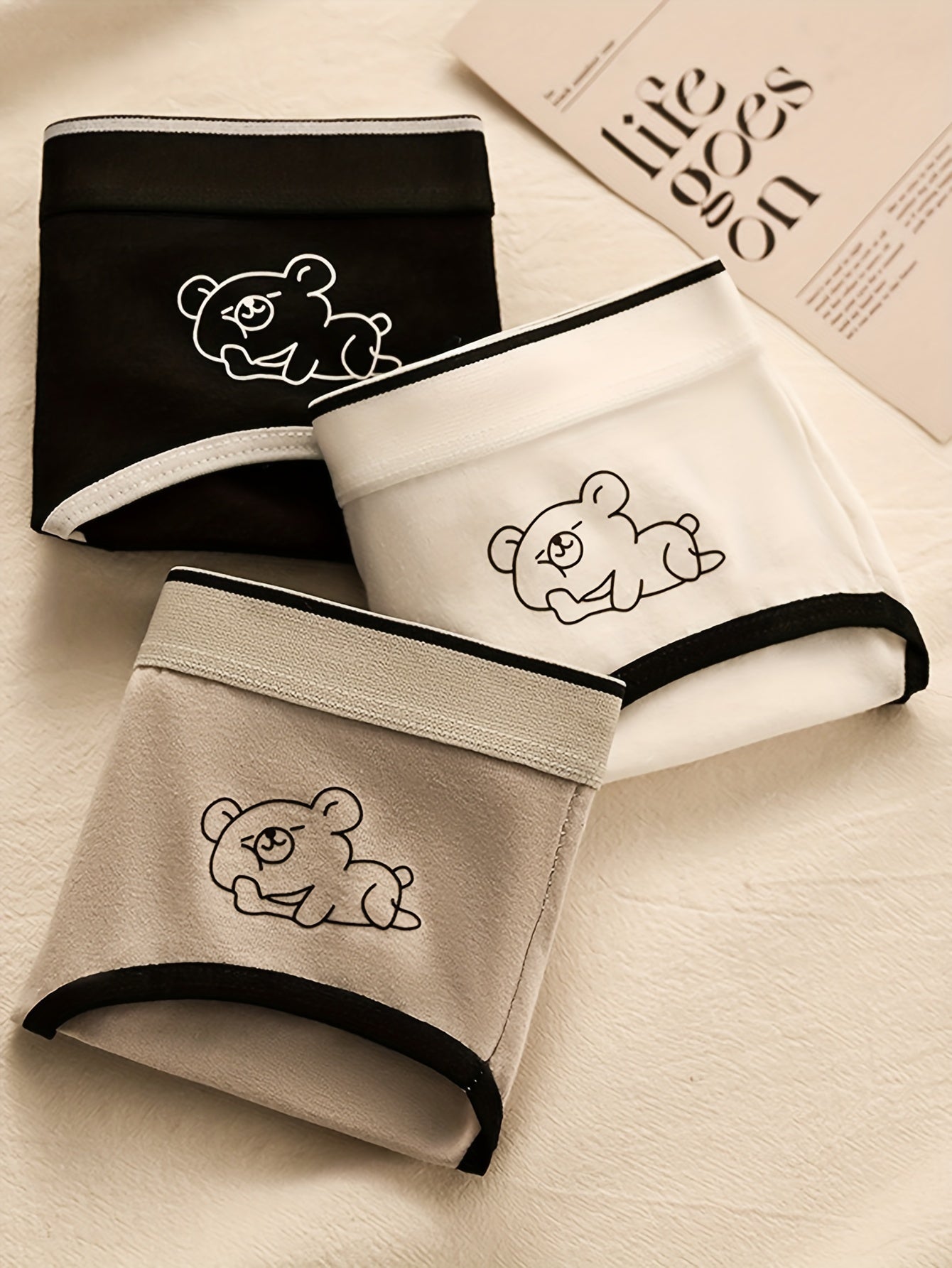 Women's 3-pack of cute cartoon bear briefs in a soft, breathable polyester blend.