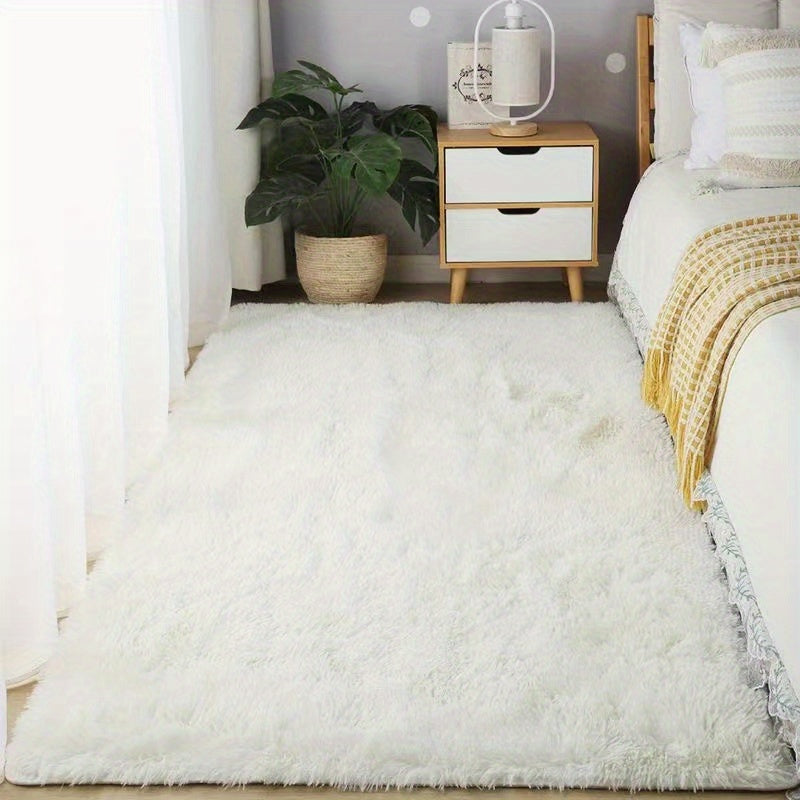 Soft, fluffy shag area rug perfect for living room or bedroom decor. This non-slip machine washable carpet adds luxury and coziness to any space.