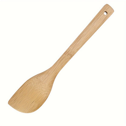 Bamboo wood spatula for non-stick cooking, perfect for Halloween and Christmas.