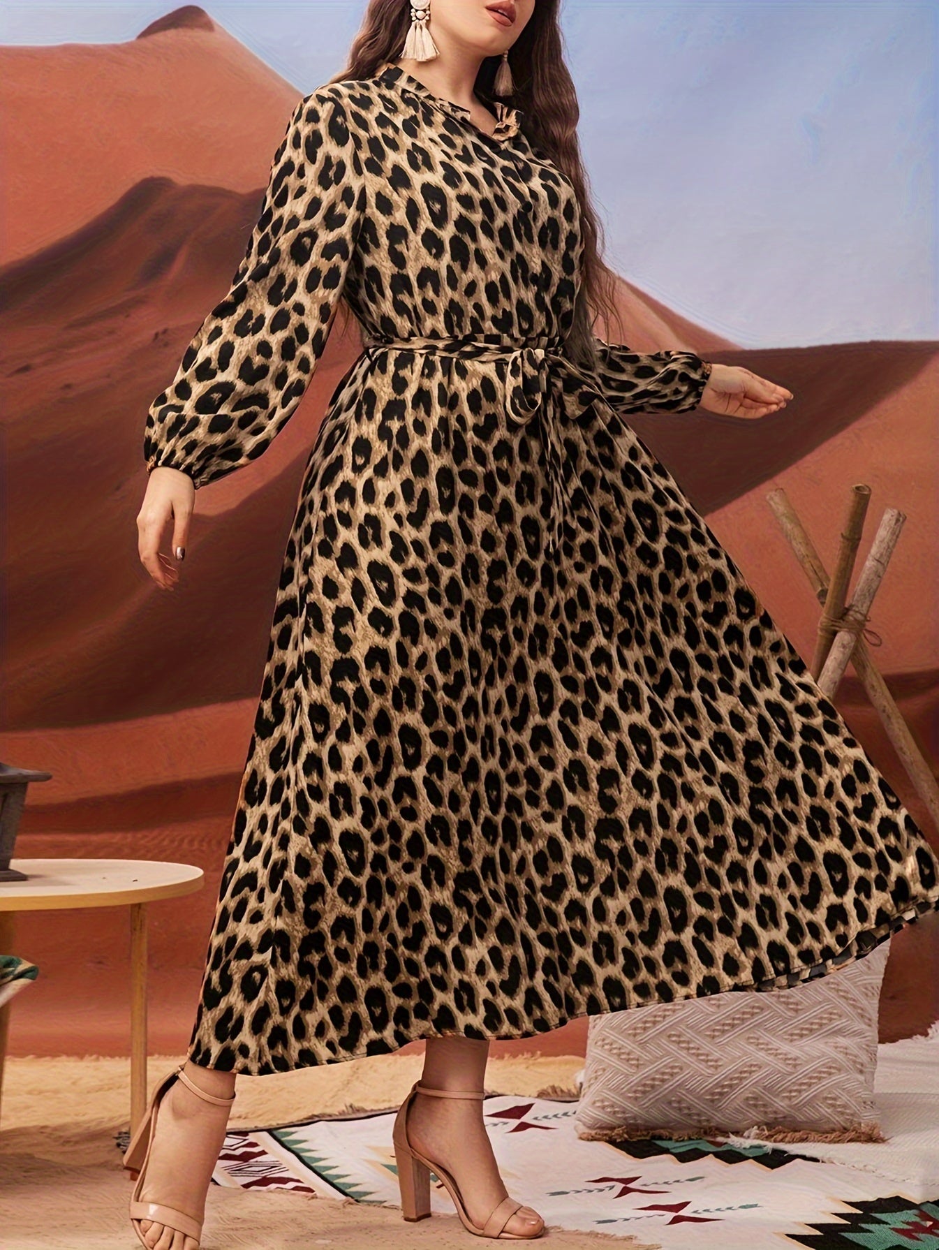 Plus-size leopard print dress with lantern sleeves, belt, collared neckline, and non-stretch polyester material. Machine washable and suitable for all seasons and occasions.