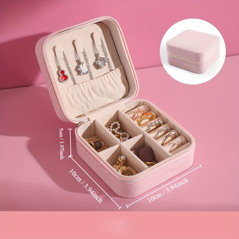 Compact faux leather jewelry organizer box for rings, necklaces, earrings & more. Portable travel case with multi-purpose storage solution. Rectangle shape for organizing.