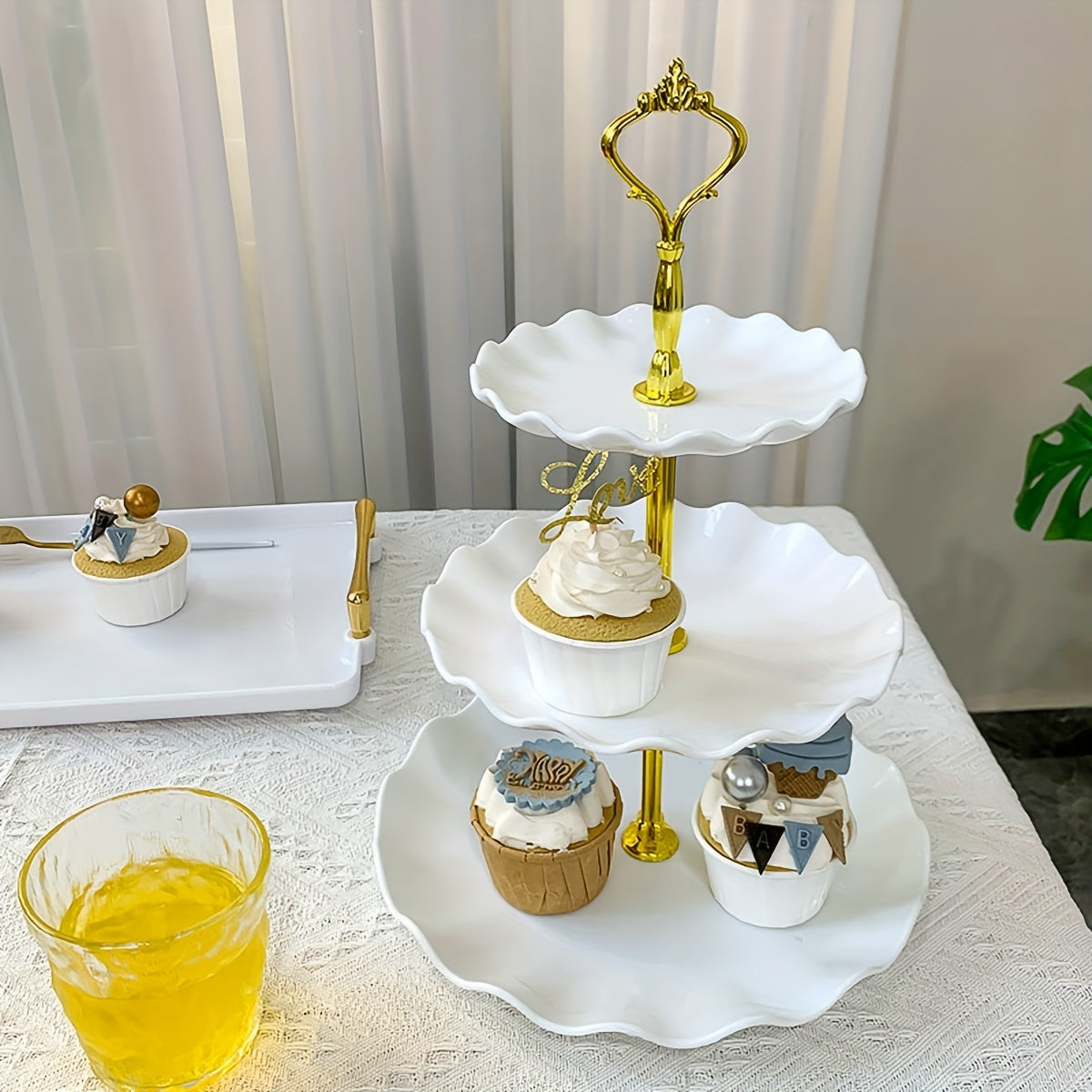 Elegant 3 tier cupcake stand with ruffled or lacy design perfect for tea parties, weddings, and more. Ideal for decorating and serving desserts at any occasion.