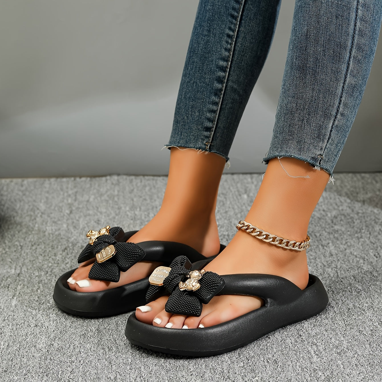 Women's bear and bow flip-flops for the summer beach with thick soles, non-slip material, and easy slip-on style.