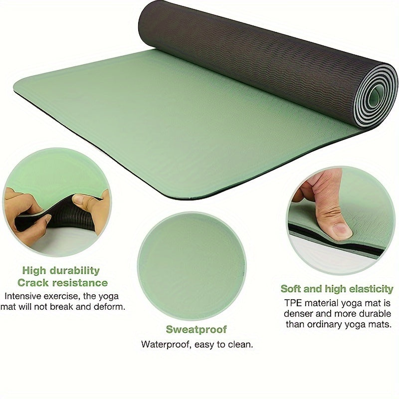 Non-slip yoga mat with textured surface and strap for yoga, pilates, and fitness workouts.